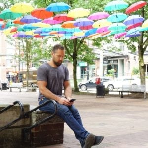 Create your perfect client avatar for coaches with Lucas Rubix Rubkiewicz on phone